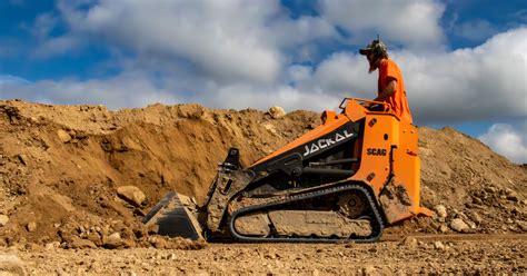 scag jackal mini skid steer price|stand behind mini skid steer.